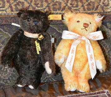 Steiff Ltd edition Bears, two 7 inch, Daisy and 100th Anniversary: Steiff Daisy bear with button and tag, 7”, brown glass eyes, yellow tipped mohair fur, original ribbon. Steiff 100th Anniversary Bear with button and tags signed by Dick Trantz in 2002, Dark