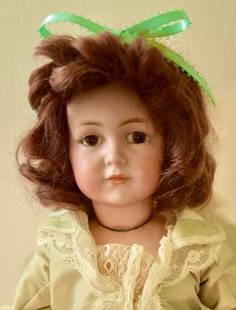 Kammer and Reinhardt 117, Mein Liebling 16 inch tall: Karmer and Reinhardt 117 Mein Liebling 16 inch, set brown glass eyes, fully jointed original body, light green dress with lace, half slip and pantalettes, white keystone shoes and socks, auburn mohair