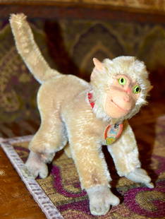 Steiff Monkey, CoCo: Steiff Monkey, CoCo Has collar and chest tag 4.5 Inch tall, 5 Inch Long. Green glass eyes, no button
