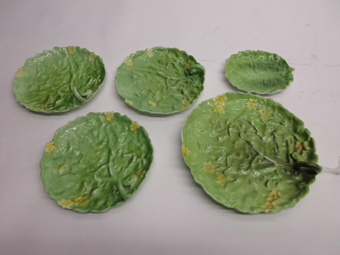 5 Royal Bayreuth Cabbage Leaf Dishes Lemon Plates: lot of 5 cabbage leaf dishes, 4 with handles, largest is 7"dia, 3 are 5 1/2"dia & 1 is 4", all have blue marks and some spots of wear, the smallest has a few tiny chips around the edge