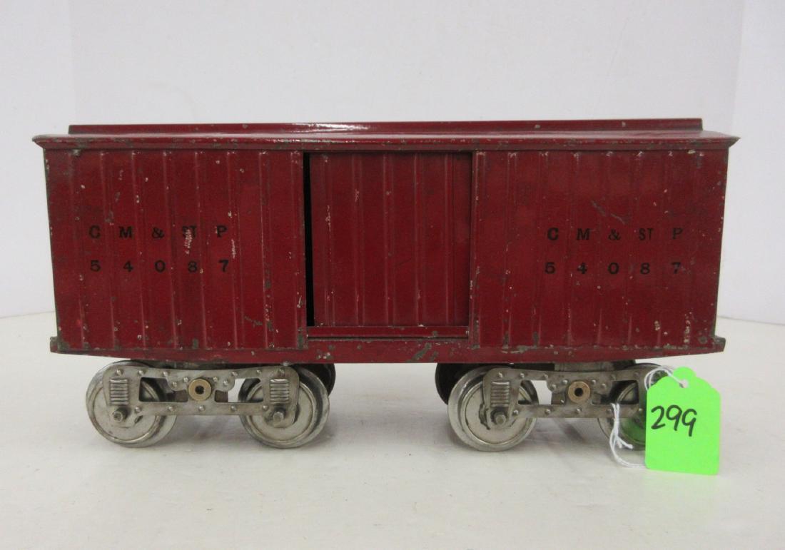 LIONEL MFG 14 CM & STP BOX CAR IN MAROON: LIONEL MFG 14 CM & STP BOX CAR IN MAROON