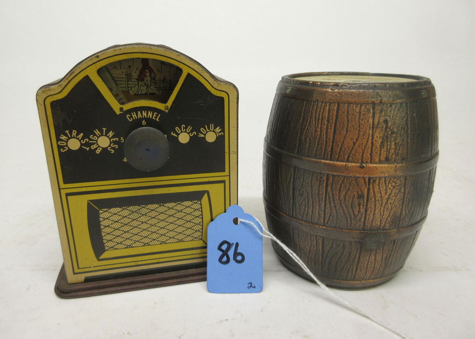 CAST BARREL COIN BANK AND TIN TELEVISION BANK (2) (1 of 1)