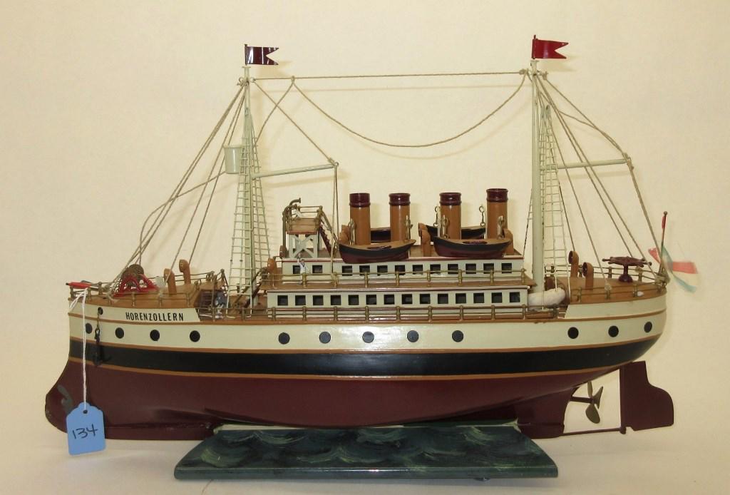 TIN SHIP TOY - APPROX 21" IN LENGTH (1 of 3)