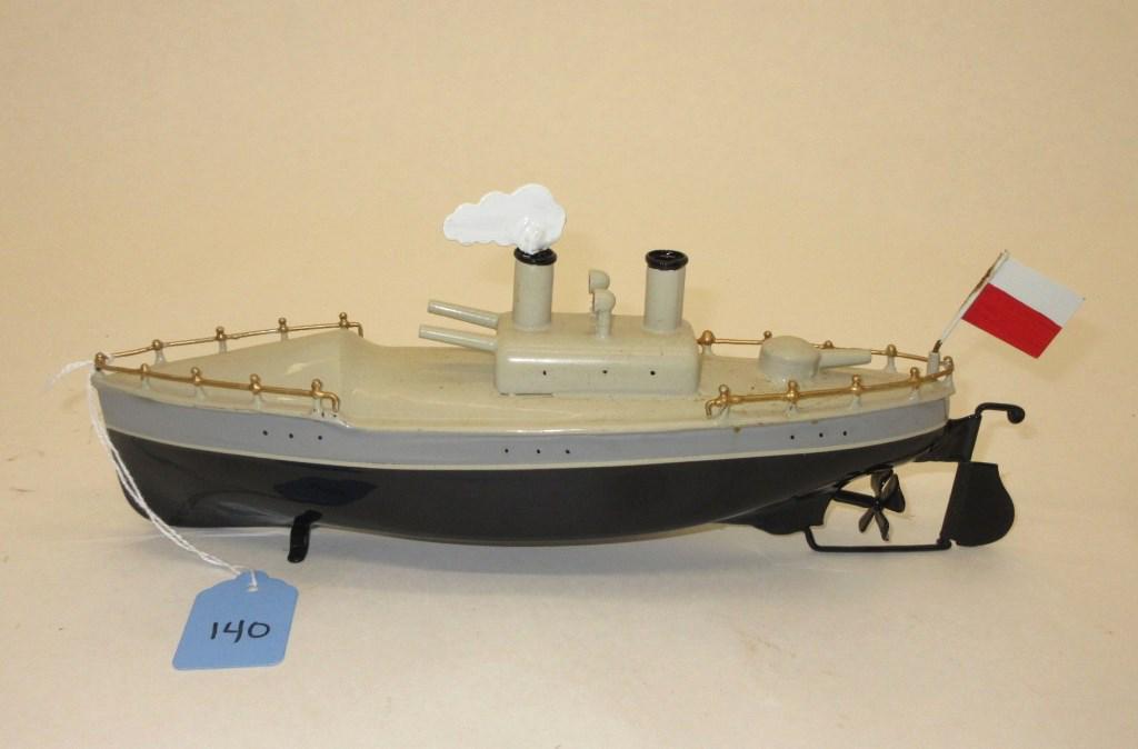 TIN SHIP TOY - APPROX 10" IN LENGTH (1 of 3)