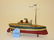 TIN SHIP TOY - APPROX 8" IN LENGTH