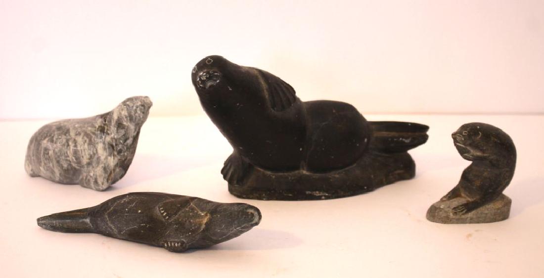 lot of 4 Inuit stone carved seals & beaver - some sgnd: lot of 4 Inuit stone carved seals & beaver - some sgnd & numbered - 4 1/2", 6" & 7" long plus a 3" tall beaver