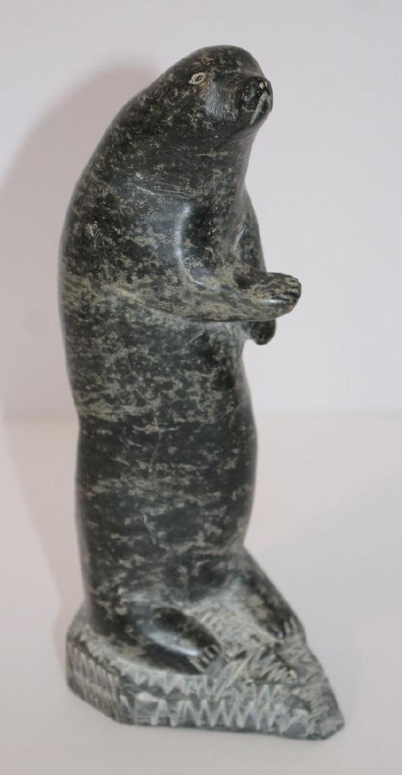 Inuit soapstone carving of a standing seal - sgnd &: Inuit soapstone carving of a standing seal - sgnd & numbered - 8 1/2" tall