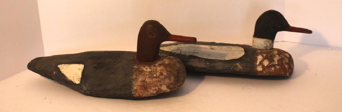 2 antique carved wooden painted duck decoys w glass: 2 antique carved wooden painted duck decoys w glass eyes & lead weights - 15 1/2" long