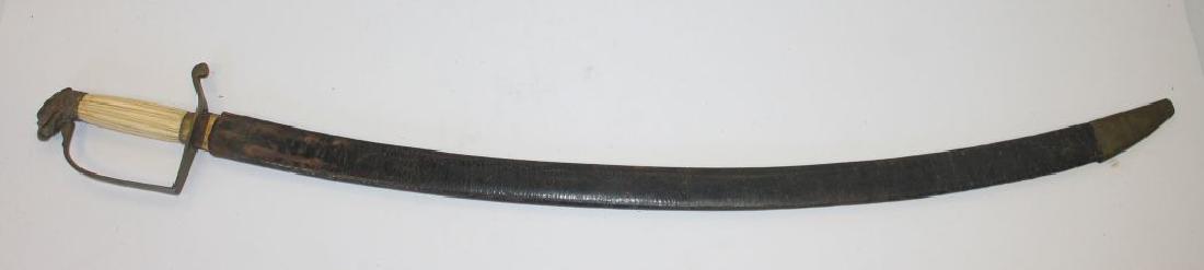 antique sword in leather sheath w bone handle & eagle: antique sword in leather sheath w bone handle & eagle head finial & brass guard - 36" long total length - blade approx 30"