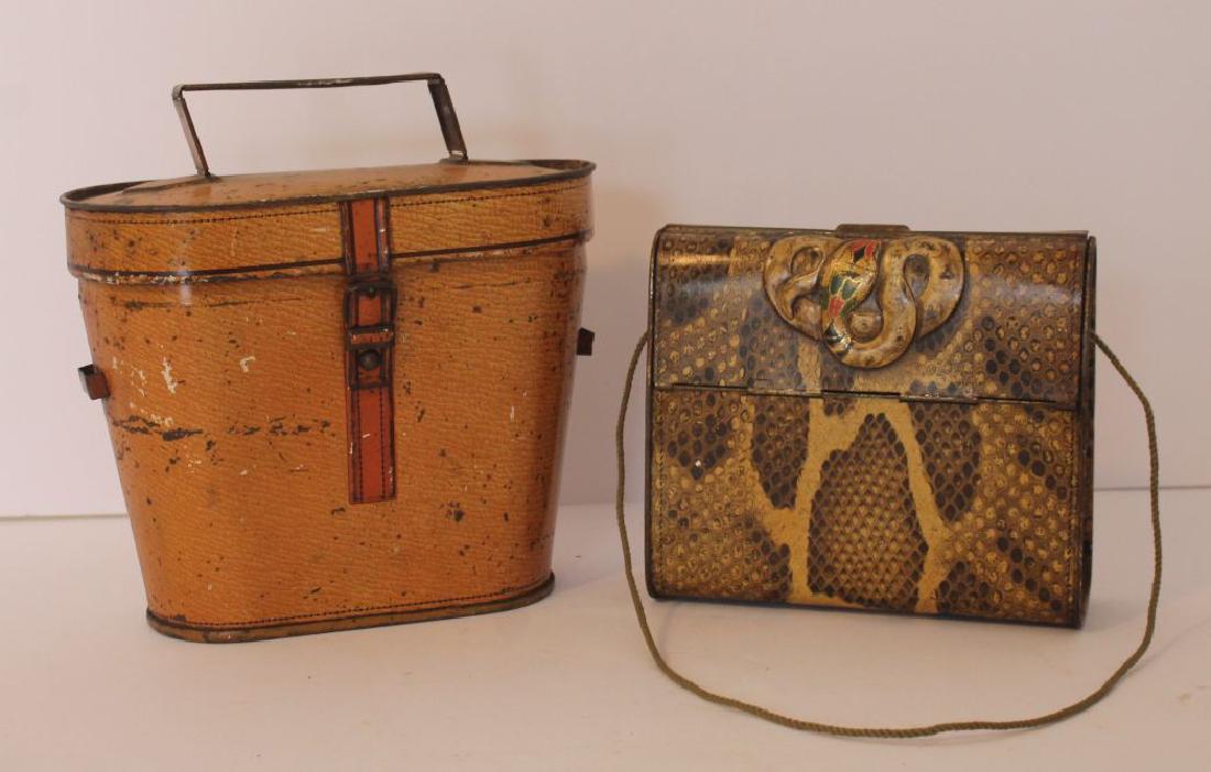 lot of 2 tin Huntley & Palmer biscuit tins - incl a: lot of 2 tin Huntley & Palmer biscuit tins - incl a binocular case w painted buckle - approx 6 3/4" tall x 7" wide plus an Art Deco purse w snake skin dec & faux cobra latch 5" tall x 5 1/2" wide (thi
