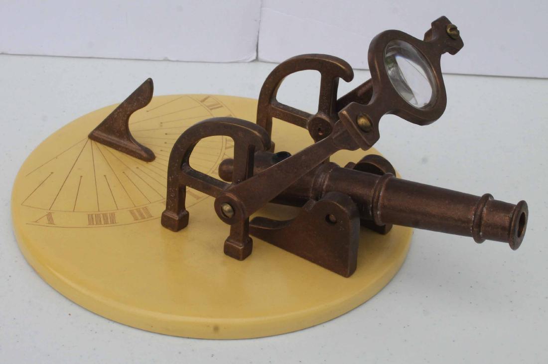 Interesting desk top sundial w cannon - 9 1/2": Interesting desk top sundial w cannon - 9 1/2"