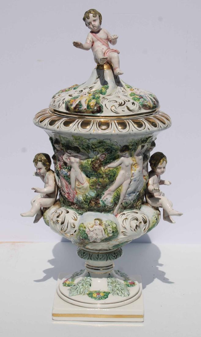 Large Capodimonte Italian porcelain center piece w: Large Capodimonte Italian porcelain center piece w cherub finial & side pieces as well as wonderful figural & floral relief dec - approx 26" tall (top finial as is)