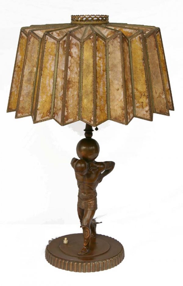 rare figural lamp depicting Atlas holding a glob