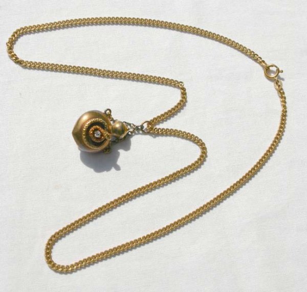 14k gold perfume bottle pendant w diamond & serpe