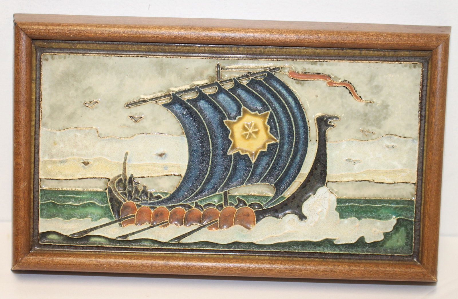 3 pottery items incl a framed Delft w ship decoration: 3 pottery items incl a framed Delft w ship decoration 9"x5"; a Boston Tile Works 6" green glazed tile & a Terra Cotta Co. 2 1/2" bust