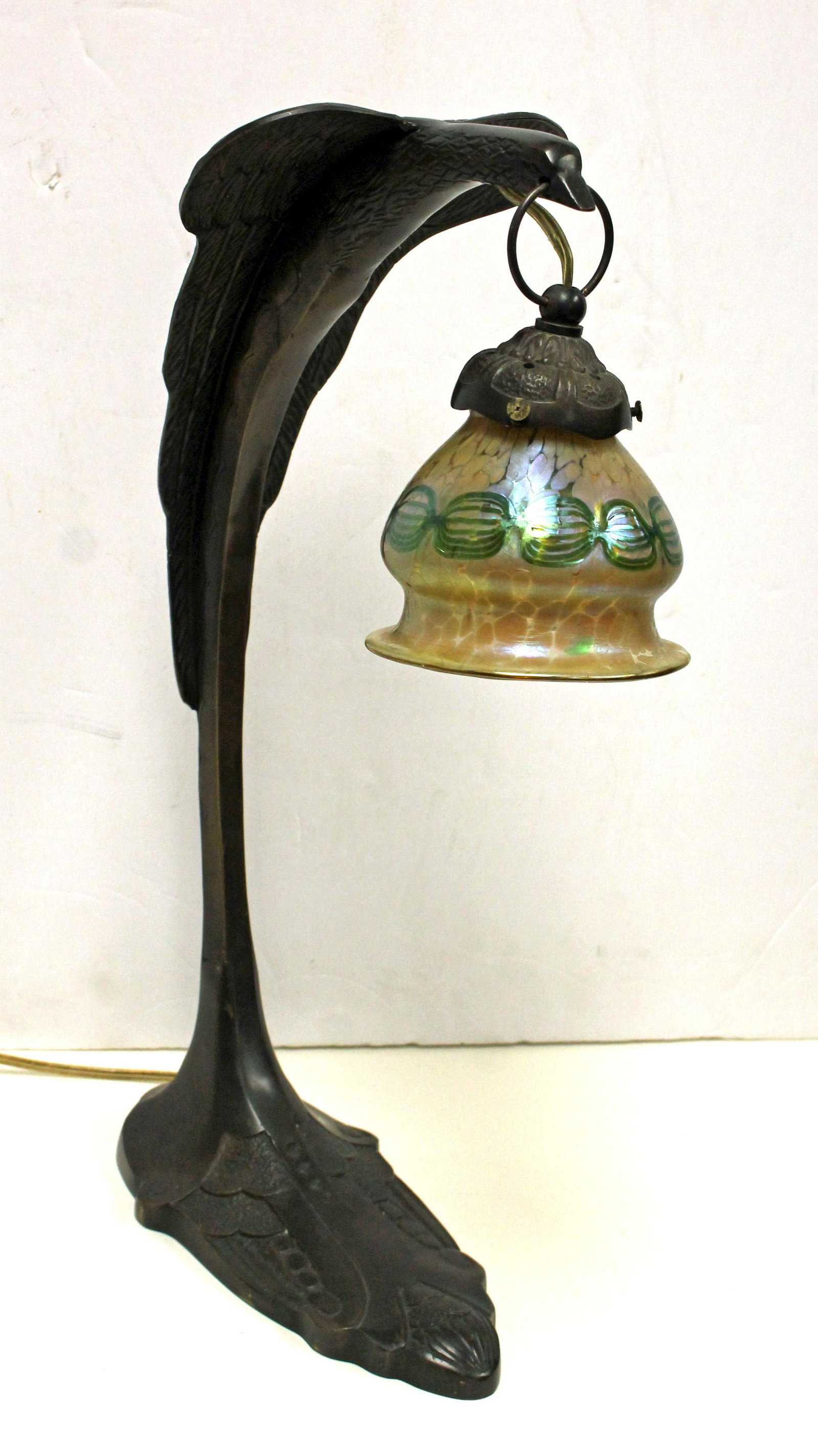 Art Nouveau bird form lamp base w Loetz art glass shade: Art Nouveau bird form lamp base w Loetz art glass shade - ring needs adjustment - small chip on fitter rim