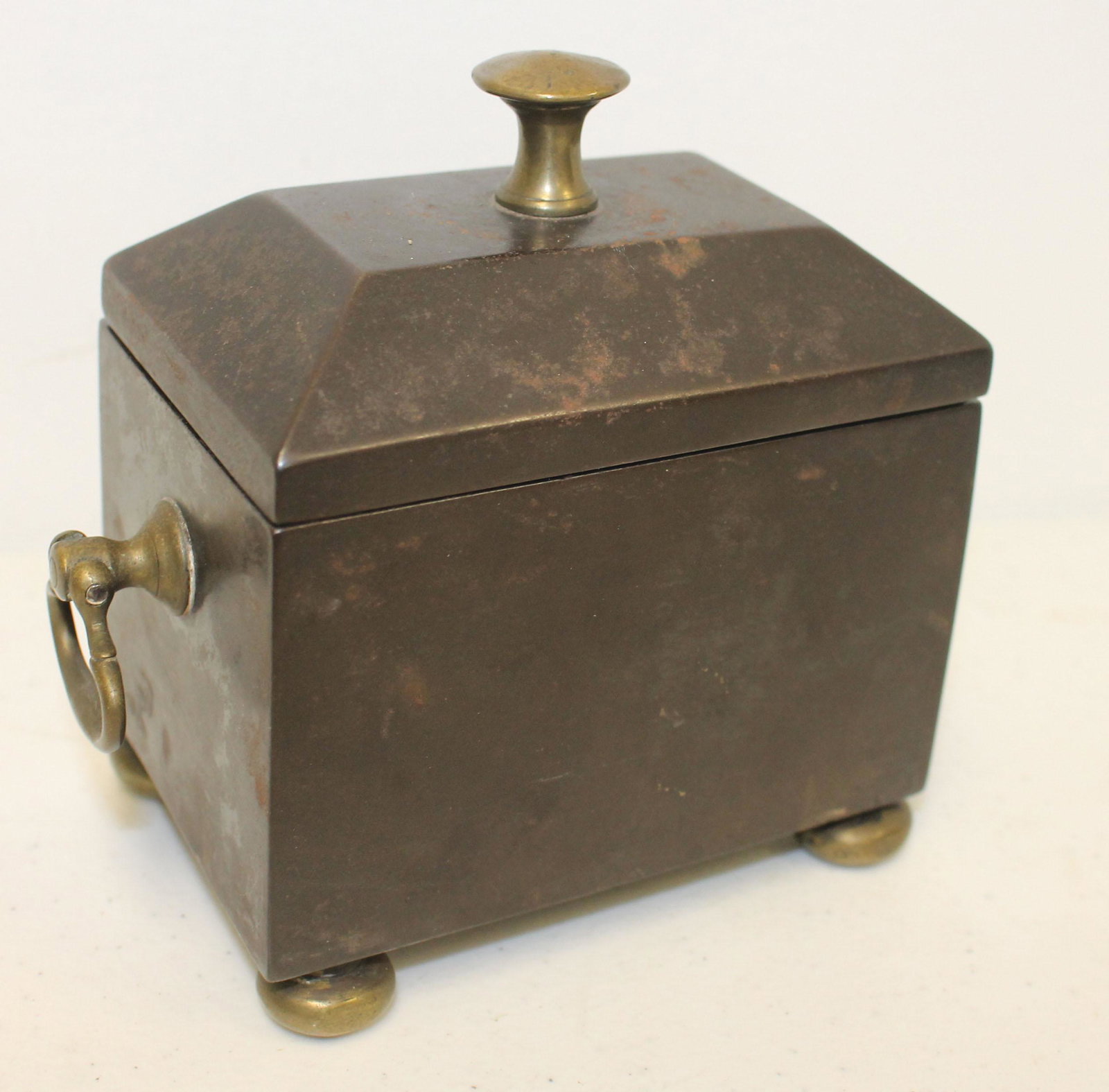 English cast iron tobacco humidor or tea caddy by: English cast iron tobacco humidor or tea caddy by Coalbrook Dale Co w brass finial & handles - complete w interior insert - 5" tall x 5 1/2" wide x 2 3/4" deep