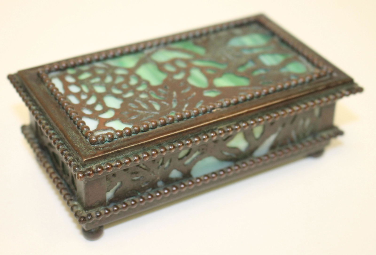 Riviere Studios bronze green glass grapevine pattern: Riviere Studios bronze green glass grapevine pattern dresser box in the manner of Tiffany