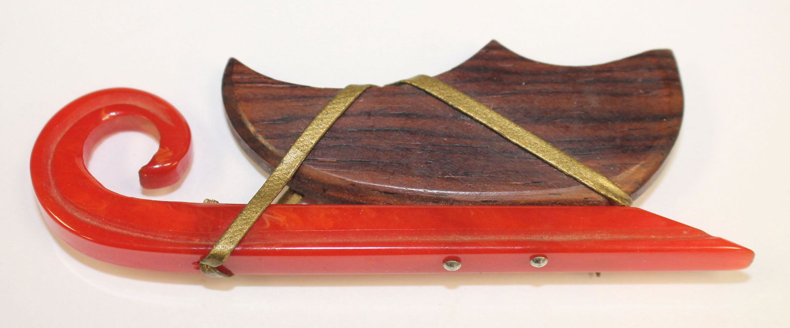 Vintage Bakelite & wood sleigh form pin w brass accents (1 of 2)