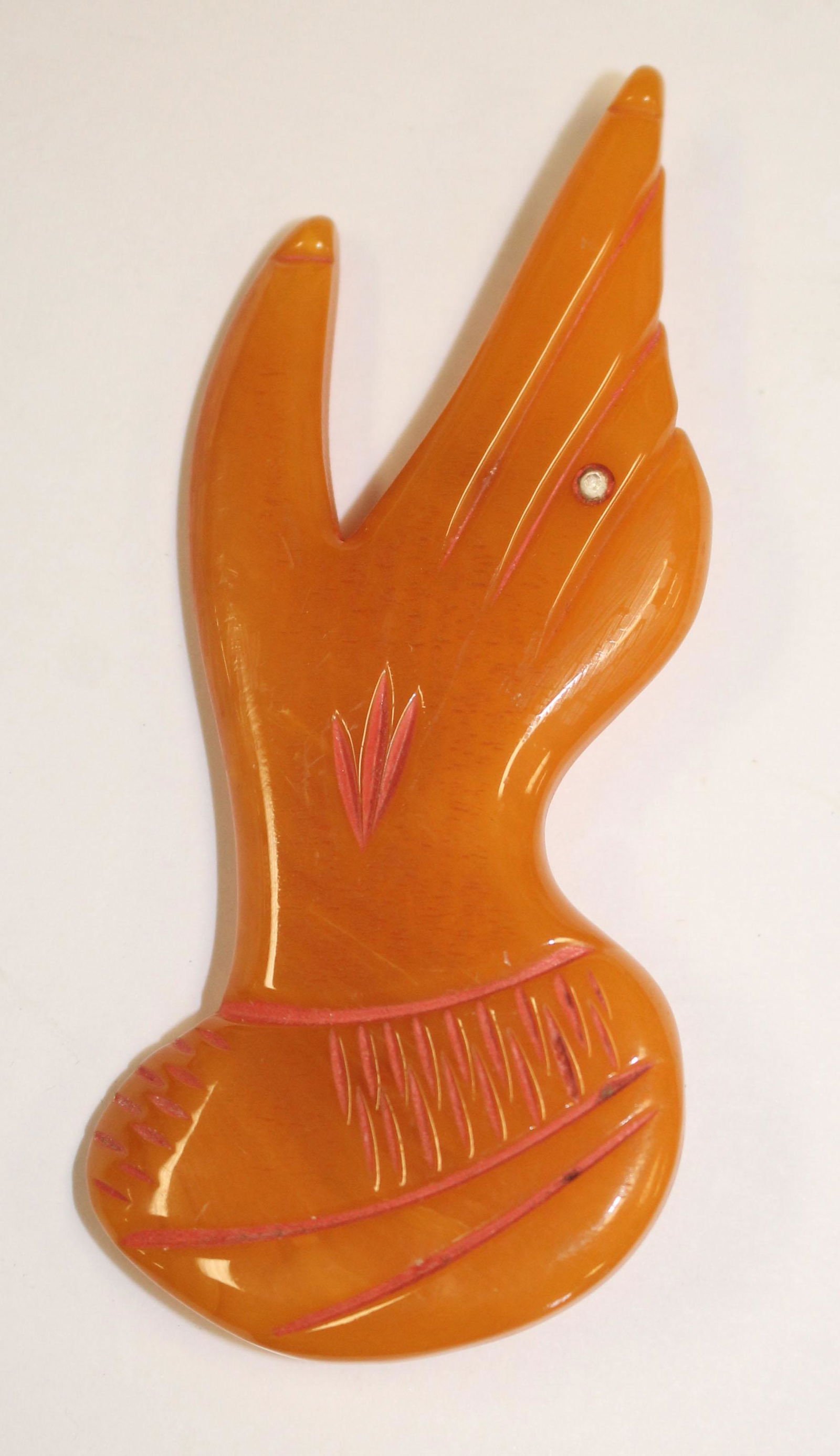 Vintage Bakelite carved hand form pin w ring on finger (1 of 2)