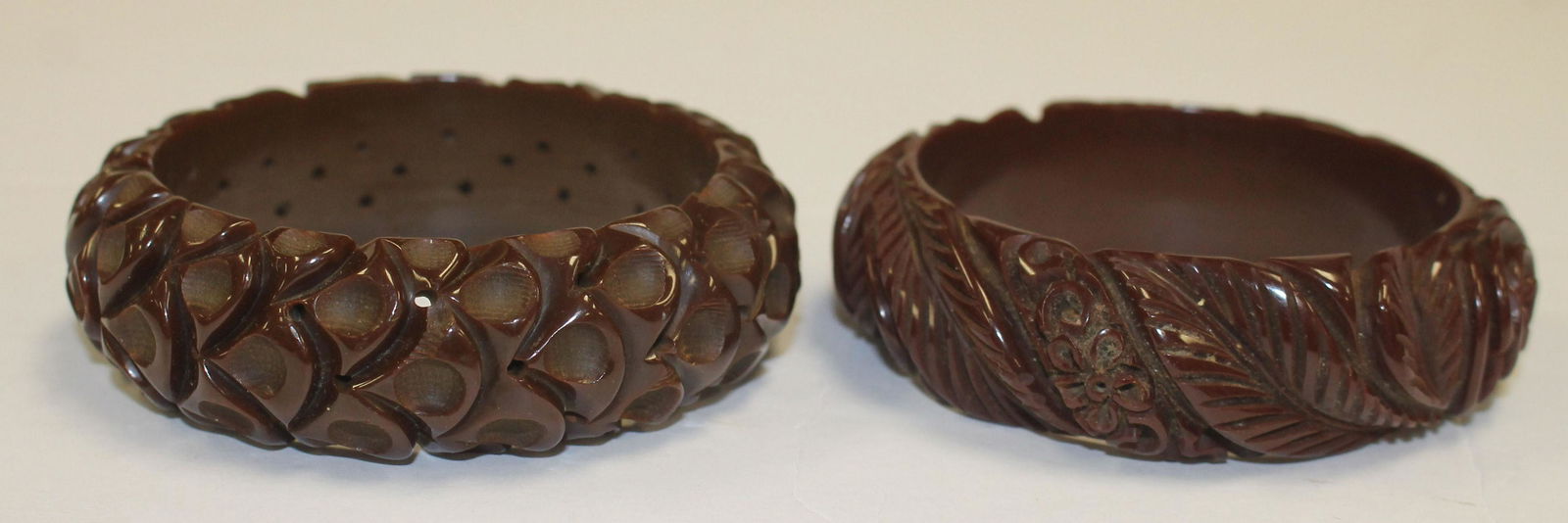 2 Vintage Bakelite carved floral & carved & pierced (1 of 3)