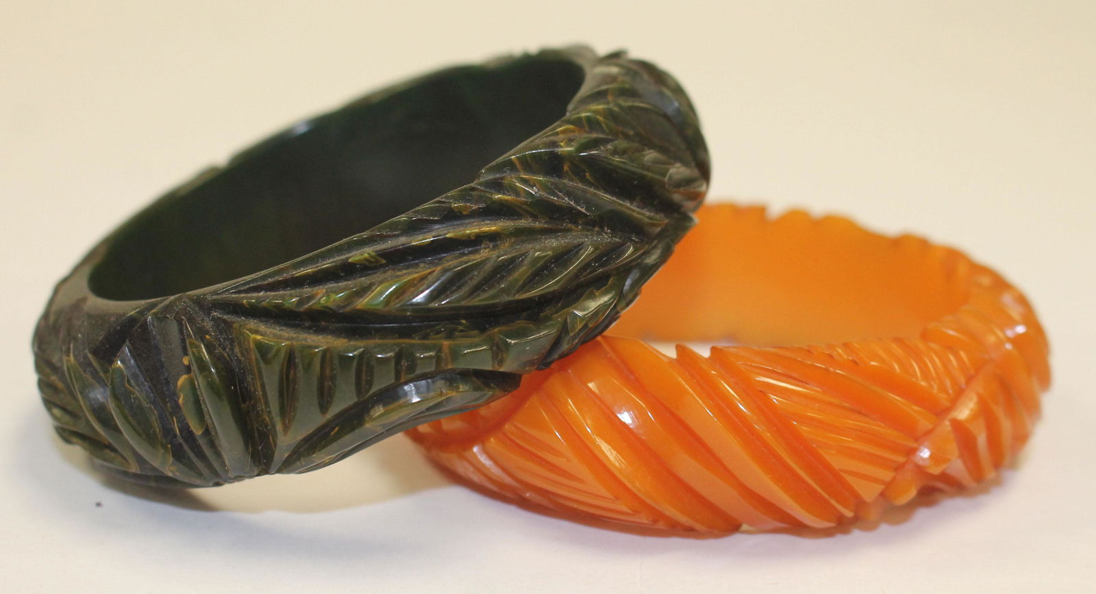 2 Vintage Bakelite carved bangle bracelets in green & (1 of 3)
