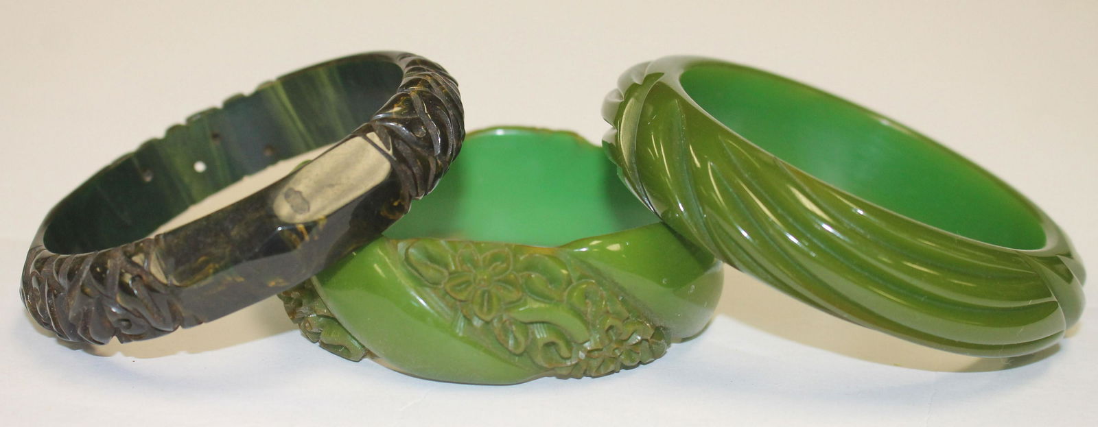 3 Vintage Bakelite carved bangle bracelets in green & (1 of 5)