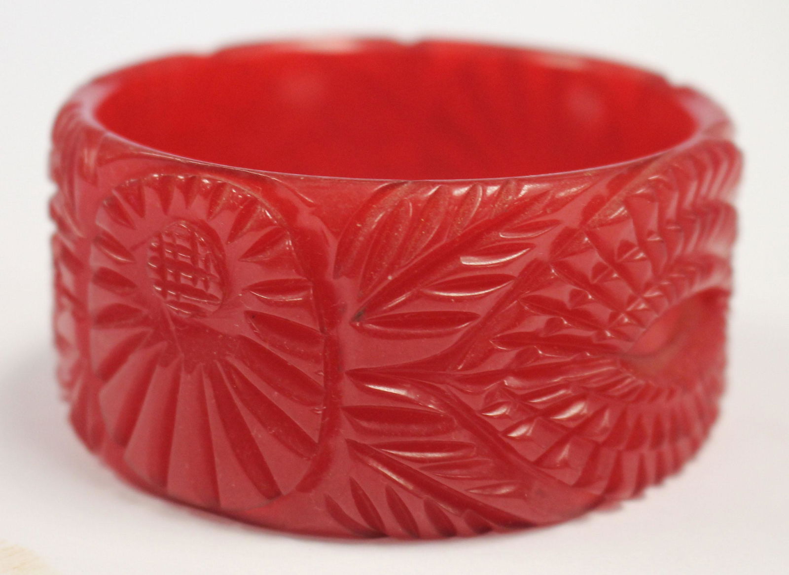 Vintage Bakelite carved red bangle bracelet - 3" diam (1 of 2)