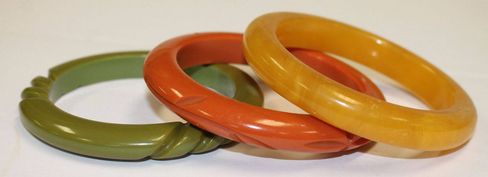 3 Vintage Bakelite bangle bracelets in orange, olive & (1 of 4)