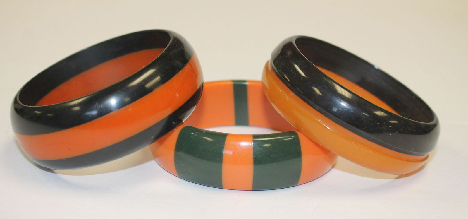 3 Vintage Bakelite orange, ebony & green laminated (1 of 4)