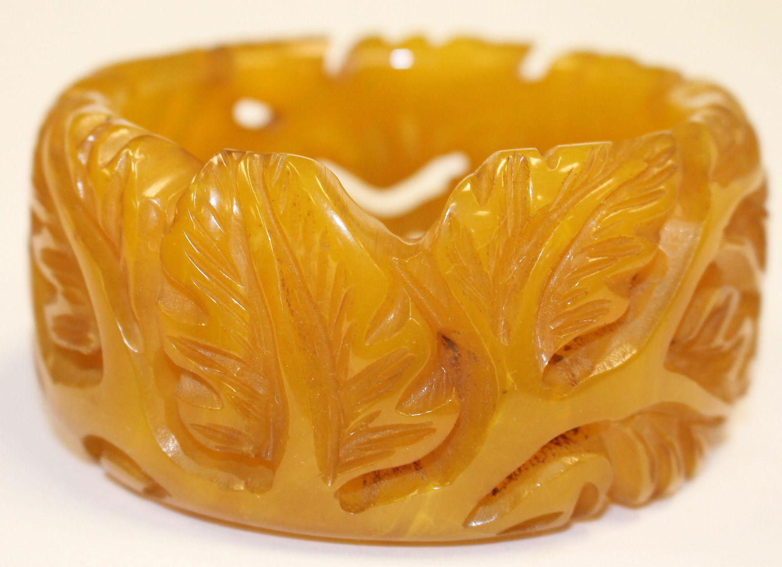 Bakelite reproduction carved bangle bracelet w leaf (1 of 3)
