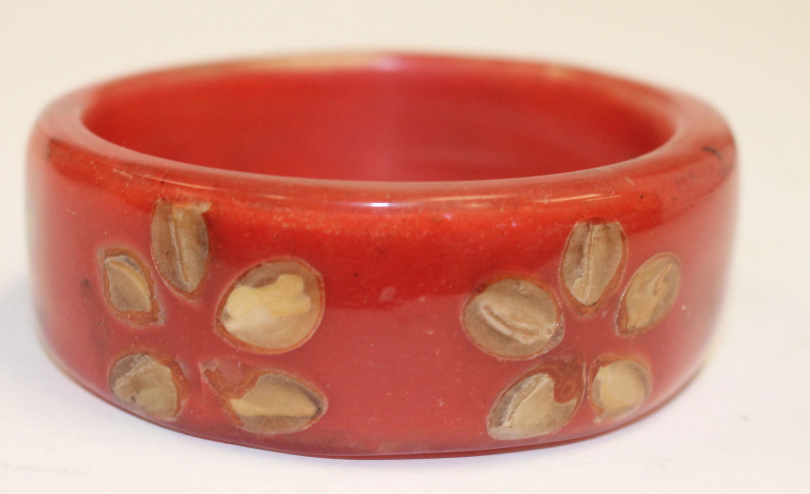Vintage Bakelite red bangle w interesting floral dec - (1 of 2)