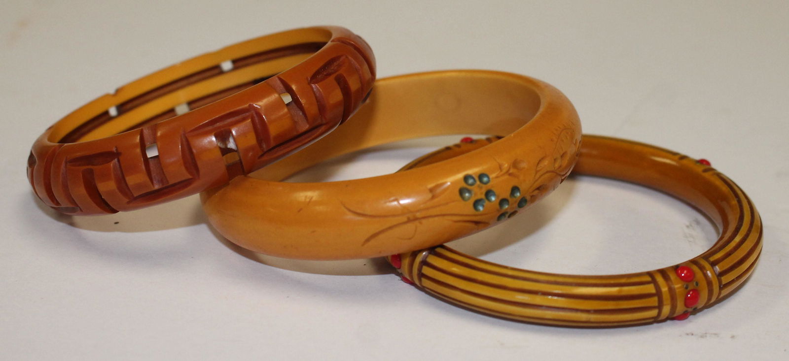 3 Vintage Bakelite carved bangles incl 1 w applied red (1 of 4)