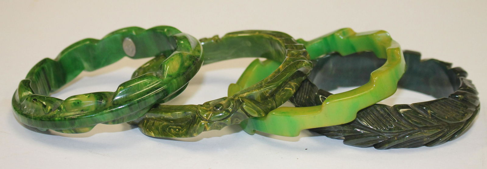 4 Vintage Bakelite green marble carved bangle bracelets (1 of 5)