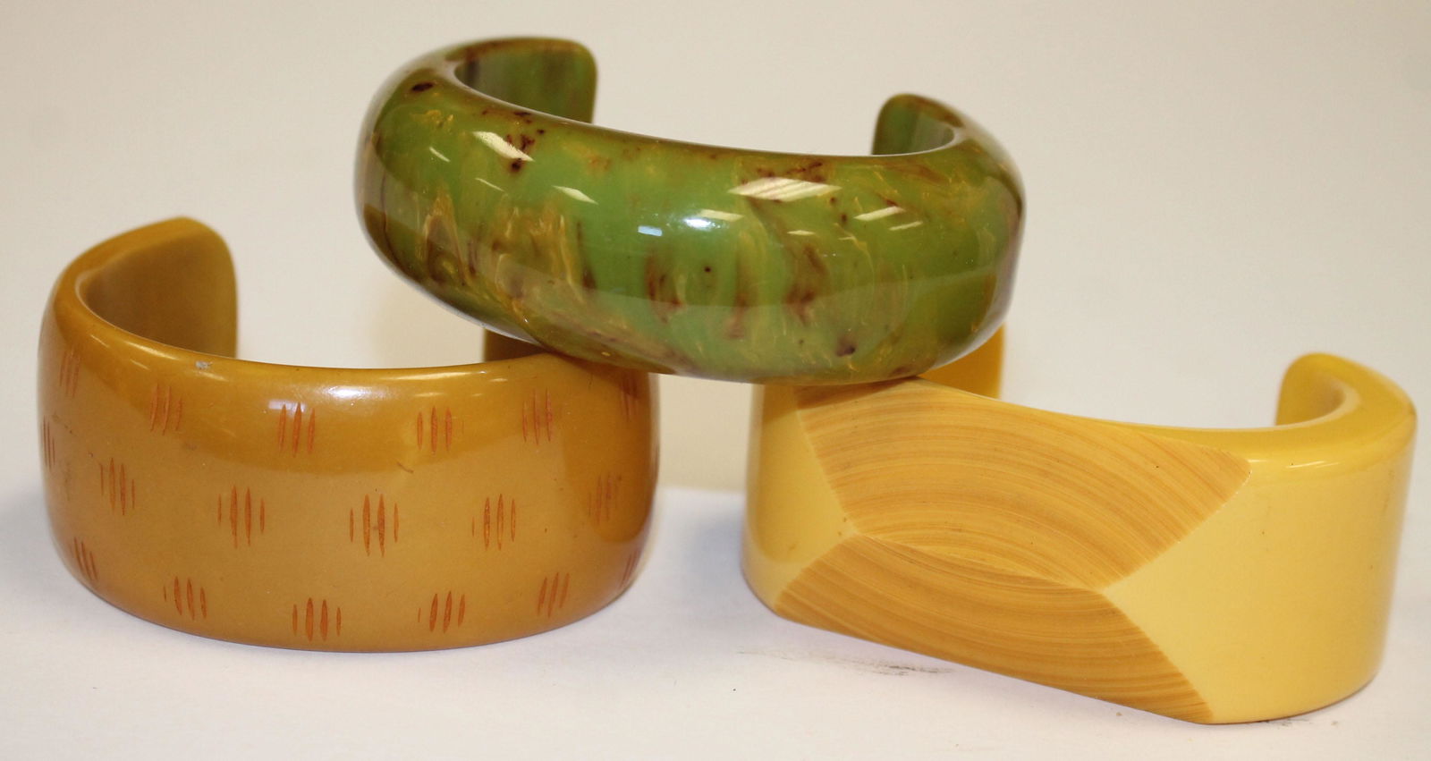 3 Vintage Bakelite cuff bracelets in yellow, brown & (1 of 4)
