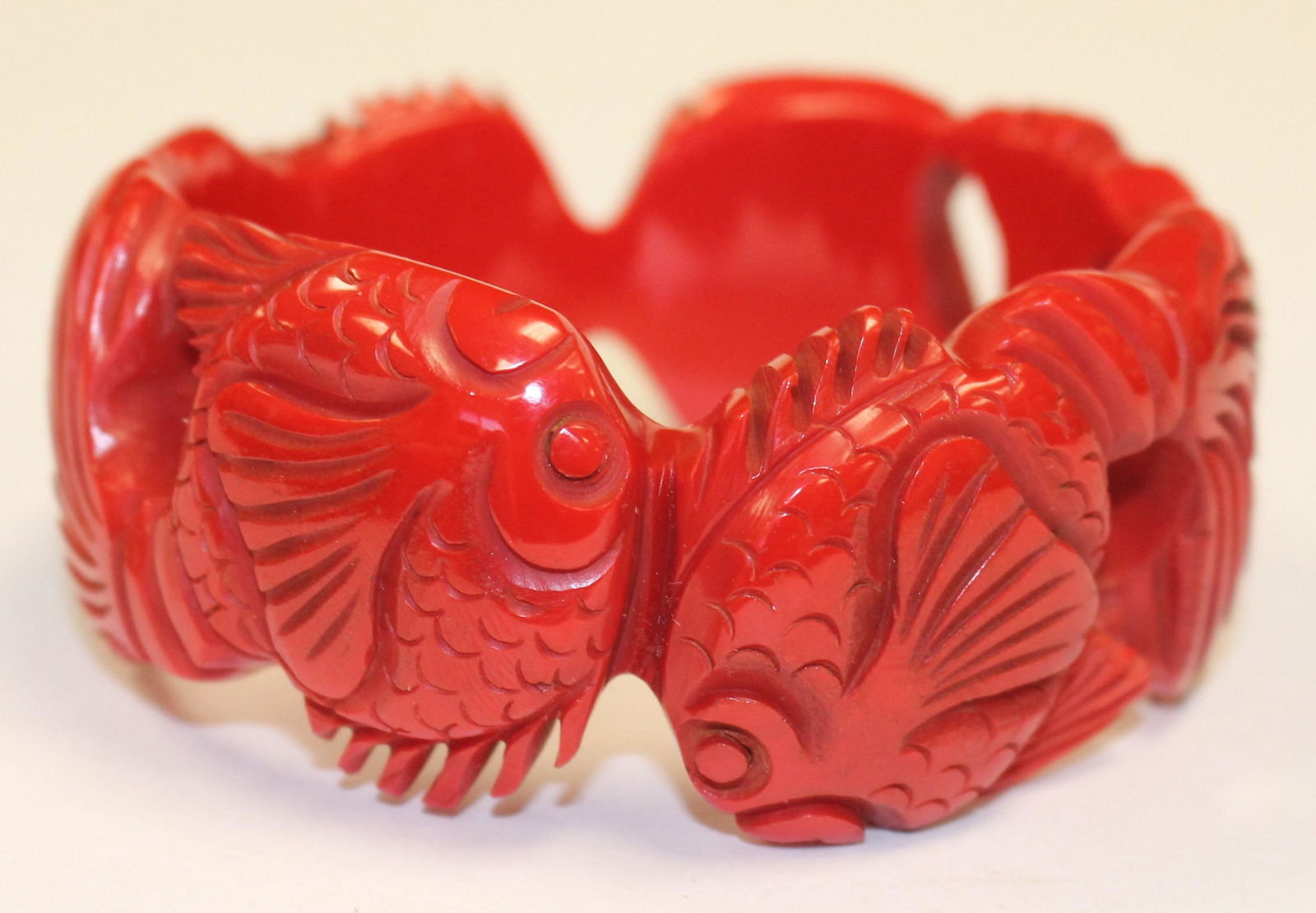 Vintage Bakelite carved red bangle bracelet w fish dec (1 of 3)