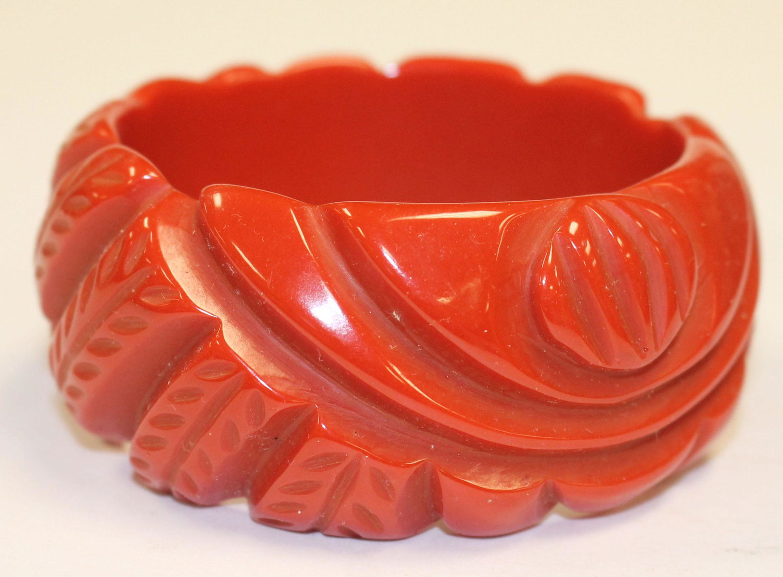 Bakelite reproduction red carved bangle bracelet (1 of 2)