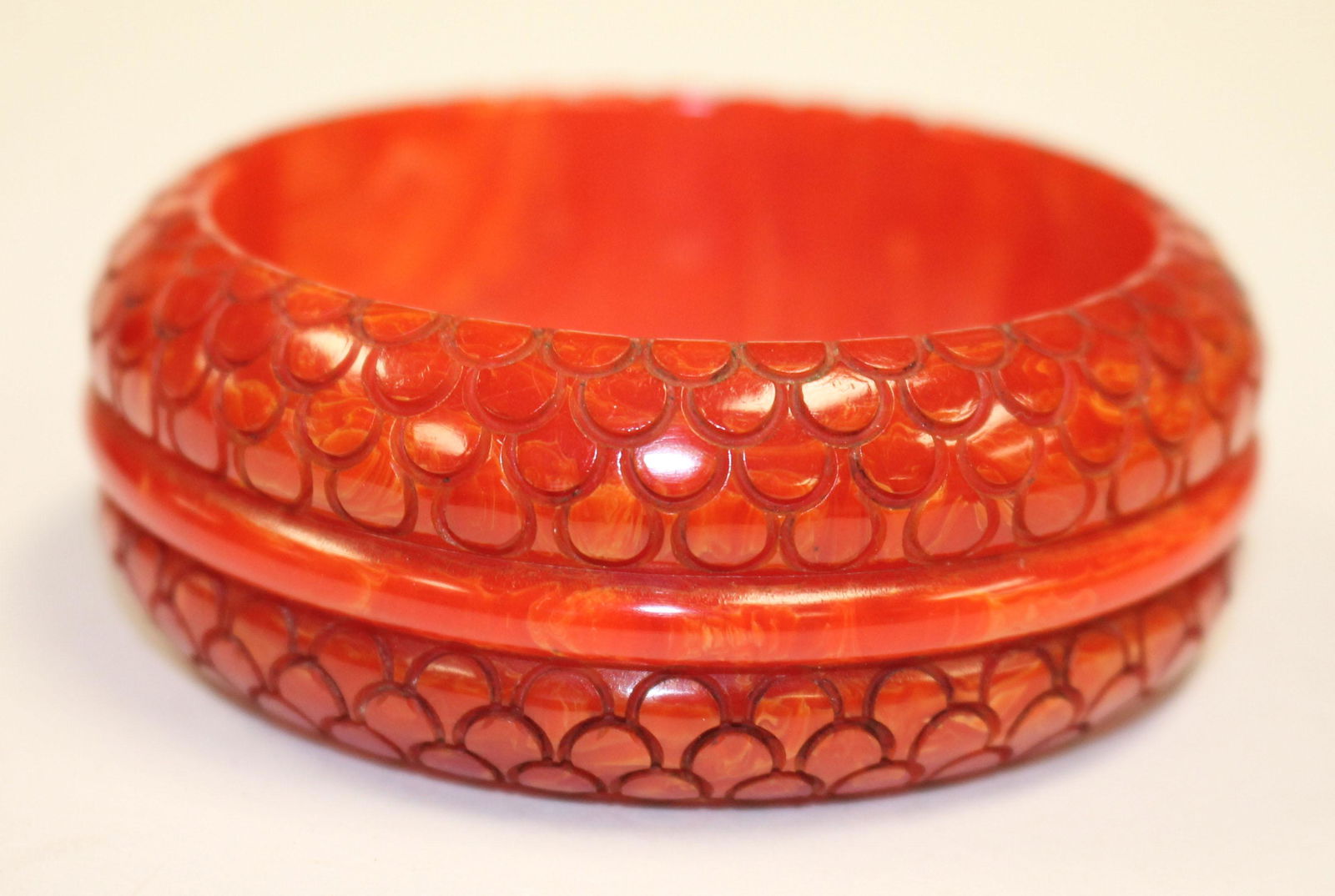 Vintage Bakelite carved red snake skin design bangle (1 of 1)