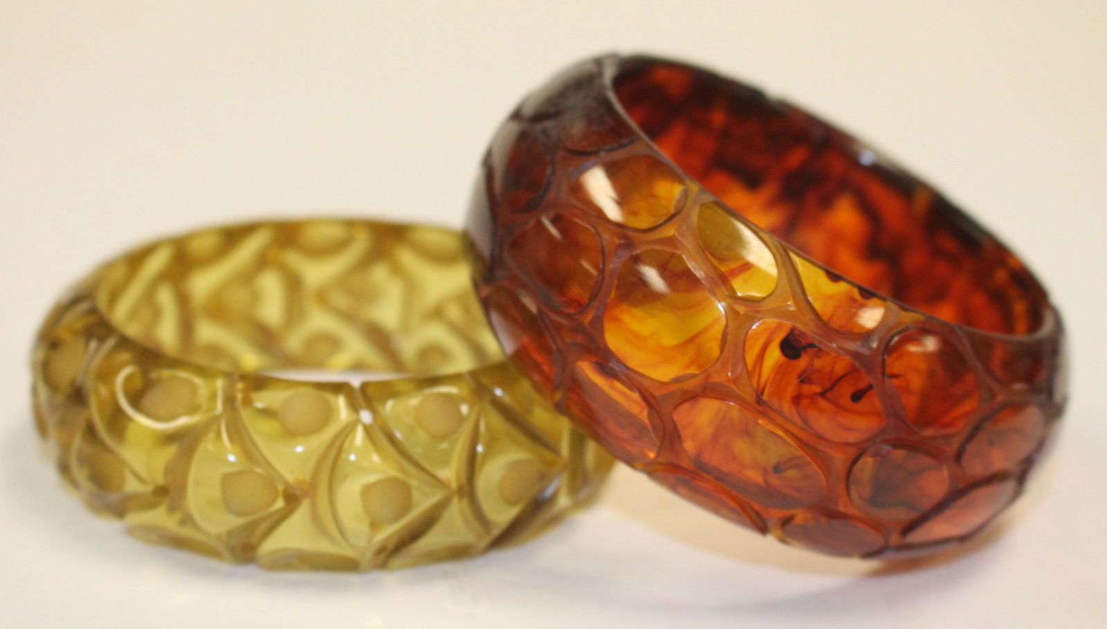 2 Vintage Bakelite translucent green & brown carved (1 of 3)