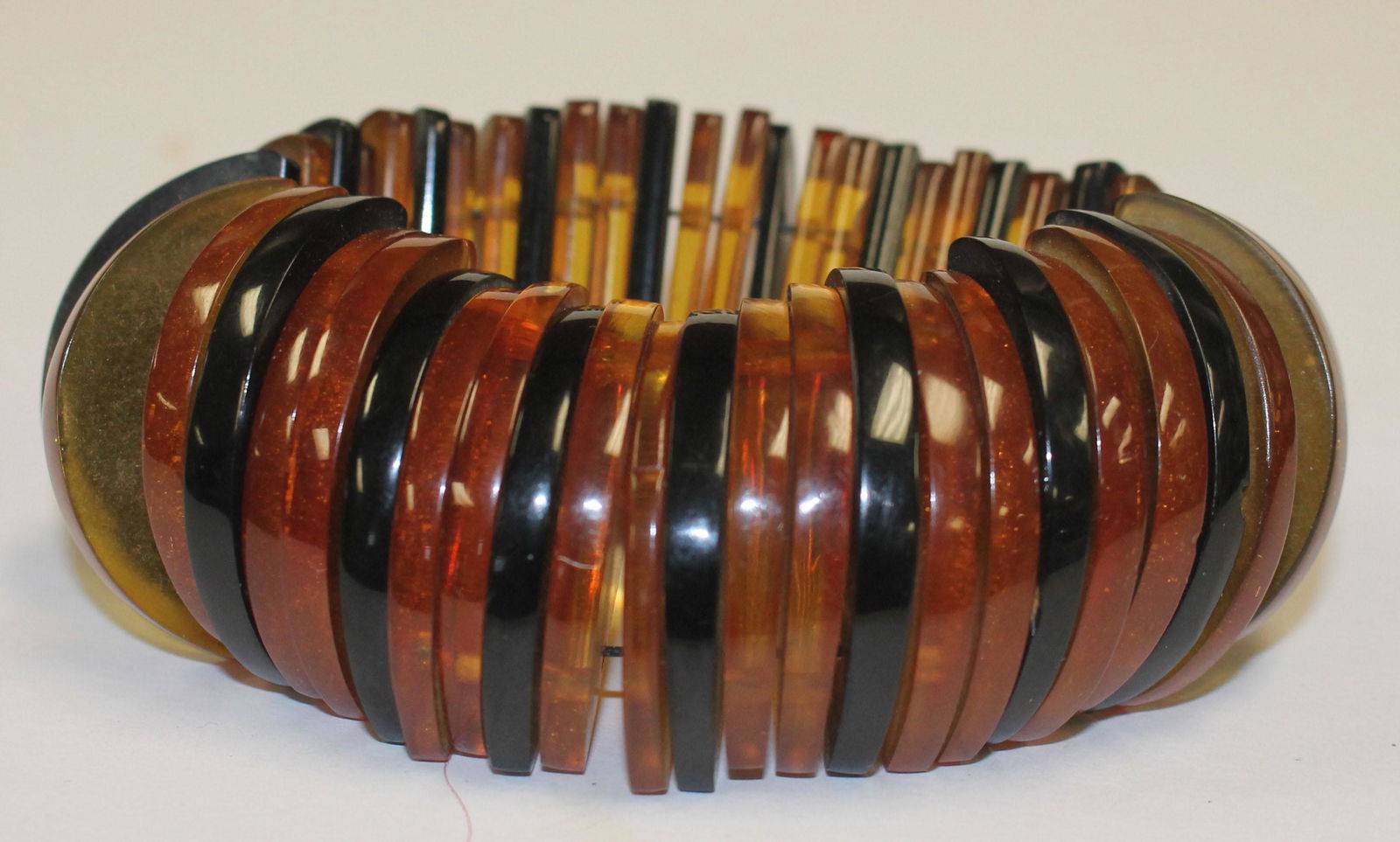 Vintage Bakelite multi color brown, amber & ebony disk (1 of 2)
