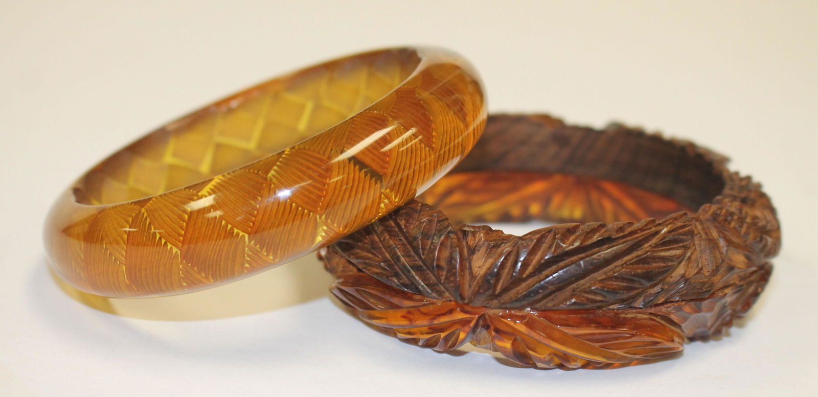 2 Vintage Bakelite bangles - 1 carved w applied wood (1 of 4)