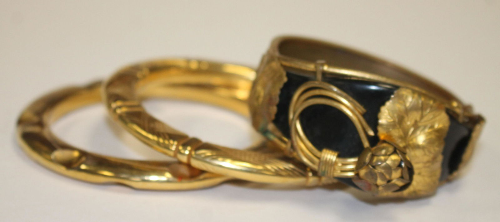 3 Vintage gold toned bangle bracelets - 1 w ebony (1 of 4)