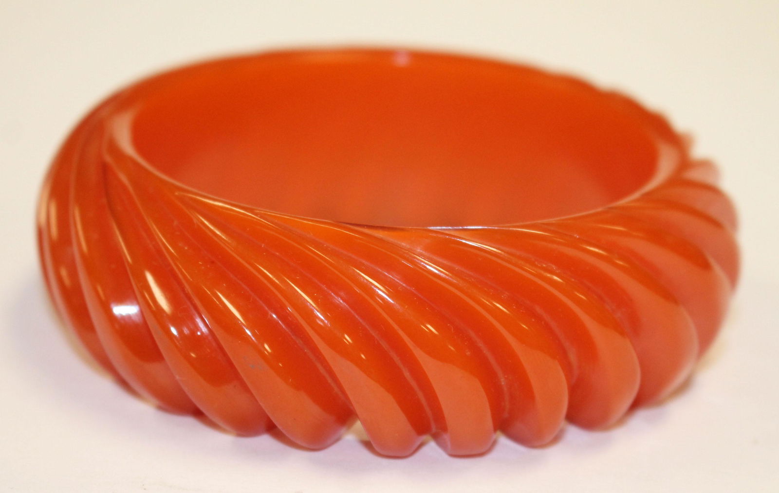 Vintage Bakelite orange swirl carved bangle bracelet - (1 of 1)