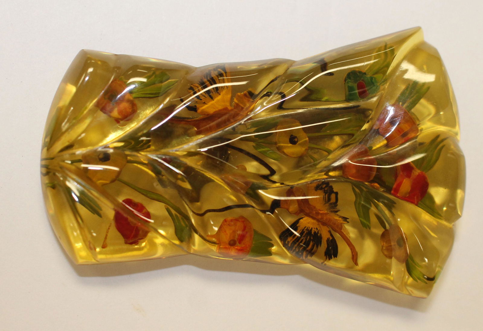 Vintage Bakelite apple juice & reverse carved floral (1 of 2)