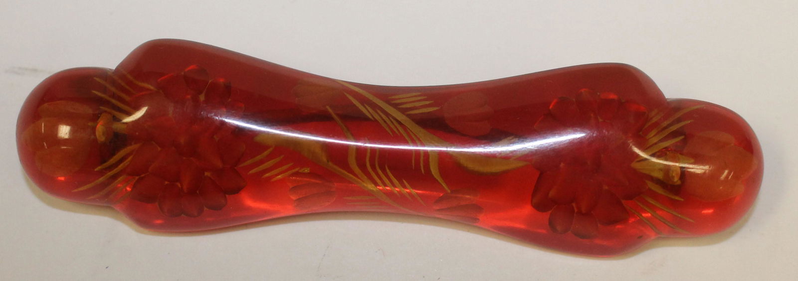 Vintage Bakelite red translucent reverse carved floral (1 of 2)