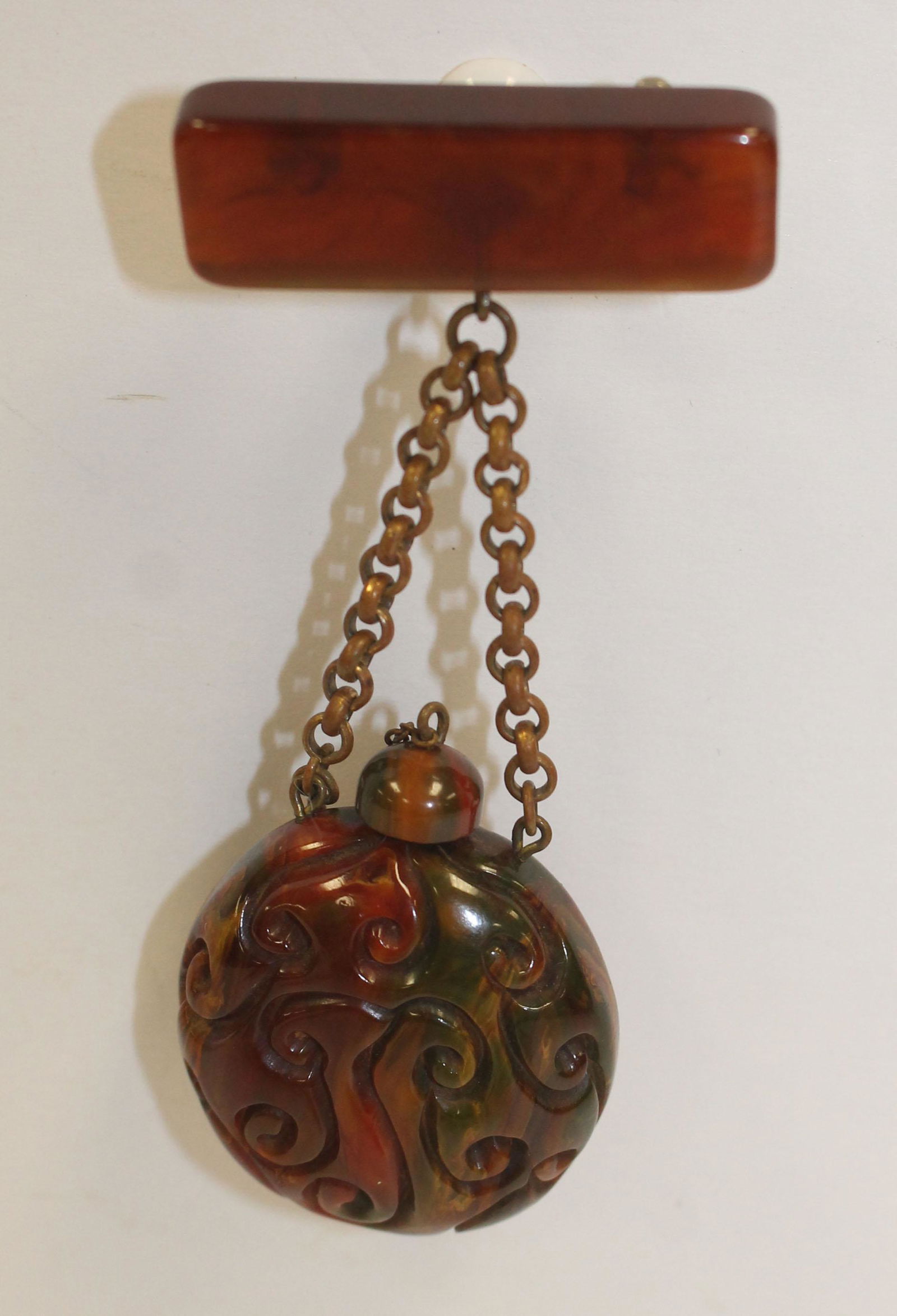 Vintage Bakelite marbled red & green hanging perfume (1 of 2)