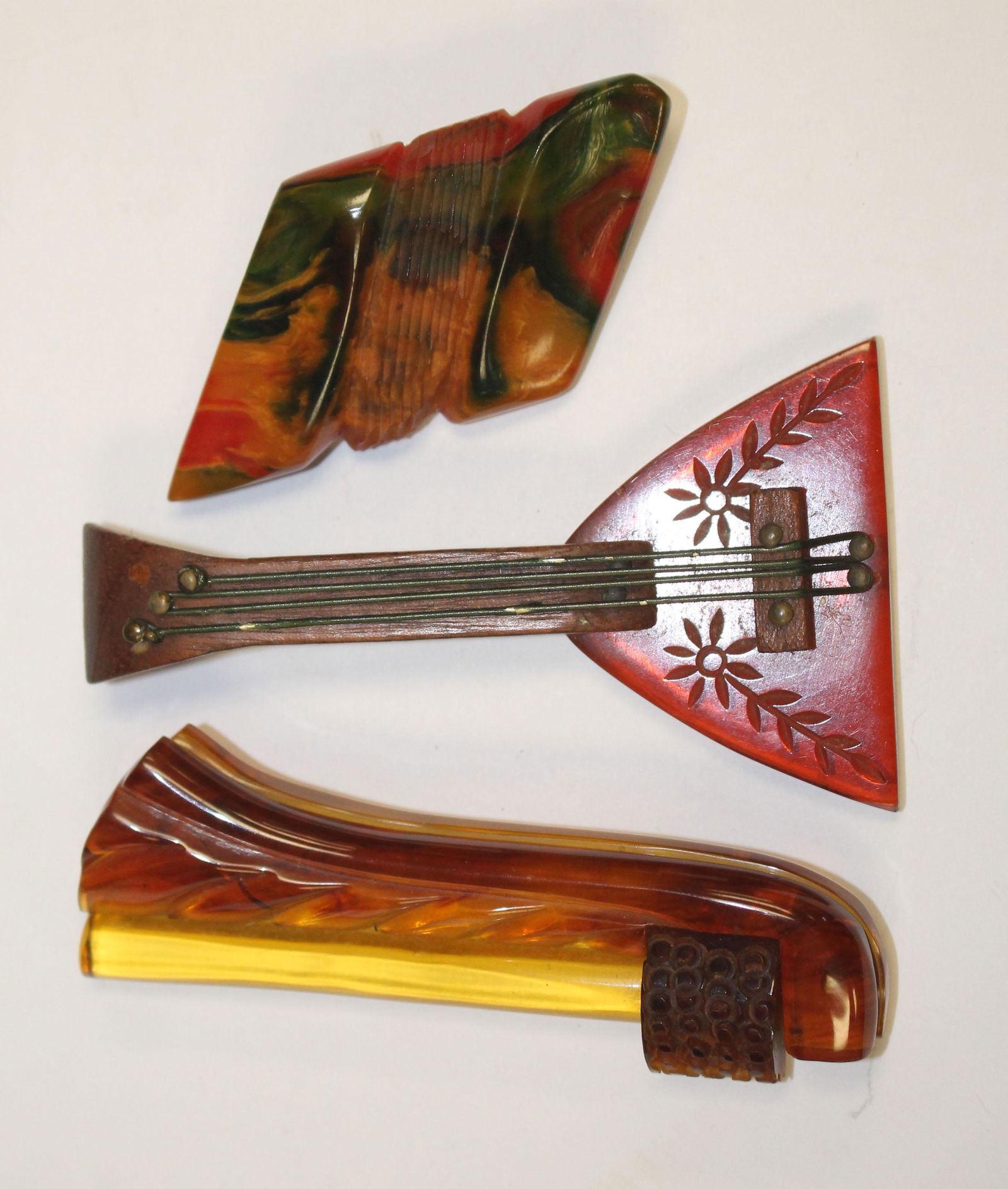 lot of 3 Vintage Bakelite carved musical instrument (1 of 5)