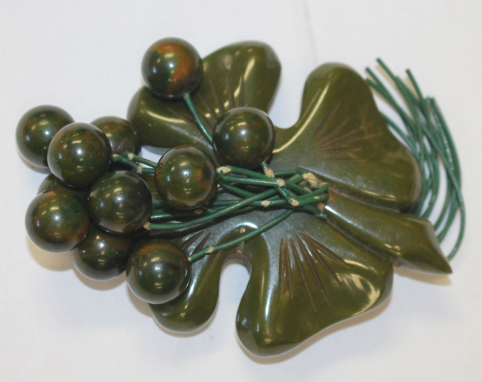 Vintage Bakelite green marble leaf w dangle balls pin - (1 of 2)