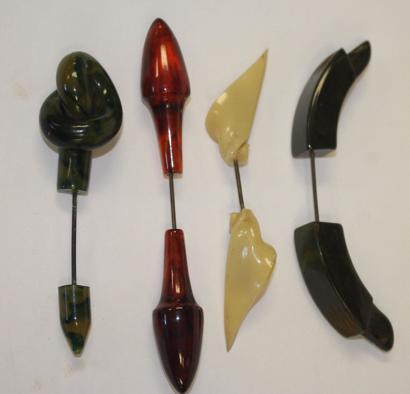 lot of 4 Vintage Bakelite hat pins in marbled green,: lot of 4 Vintage Bakelite hat pins in marbled green, translucent brown & ivory - 3 3/4" - 4 1/2"
