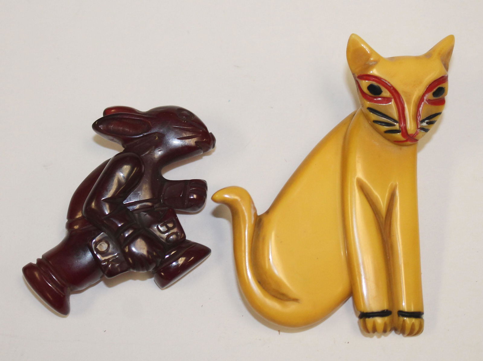 lot of 2 Bakelite or other plastic jointed pins (1 of 6)